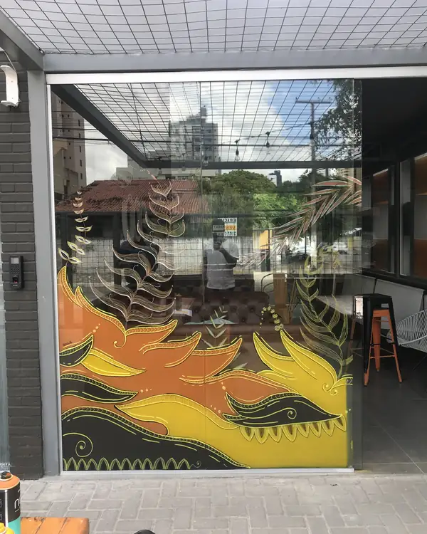 Flame mural on the glass front of a restaurant